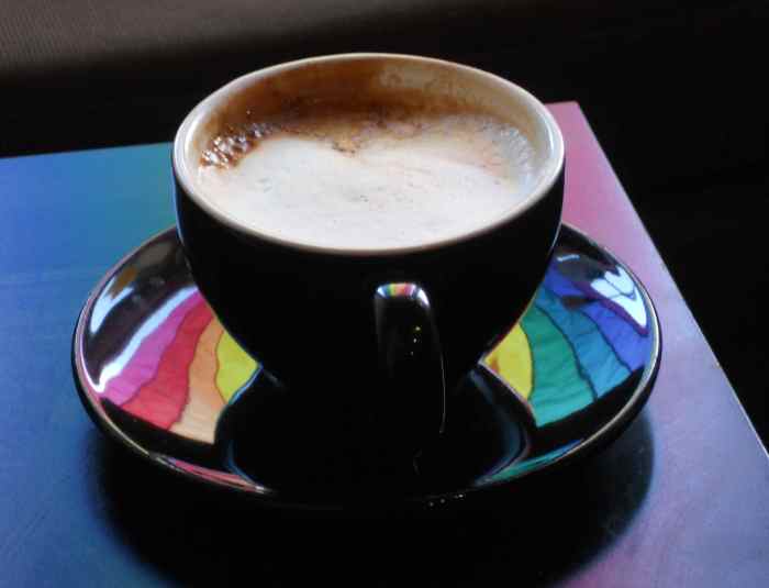 Coffee Cup at Wicked Grounds With Reflected Pride Rainbow