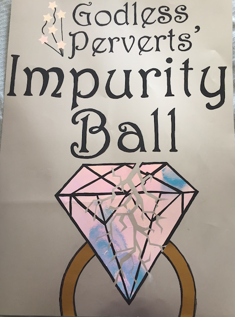 sign reading "Godless Perverts Impurity Ball" with image of diamond ring