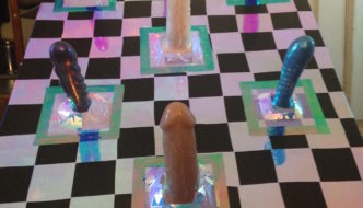 Ring toss game made with dildos